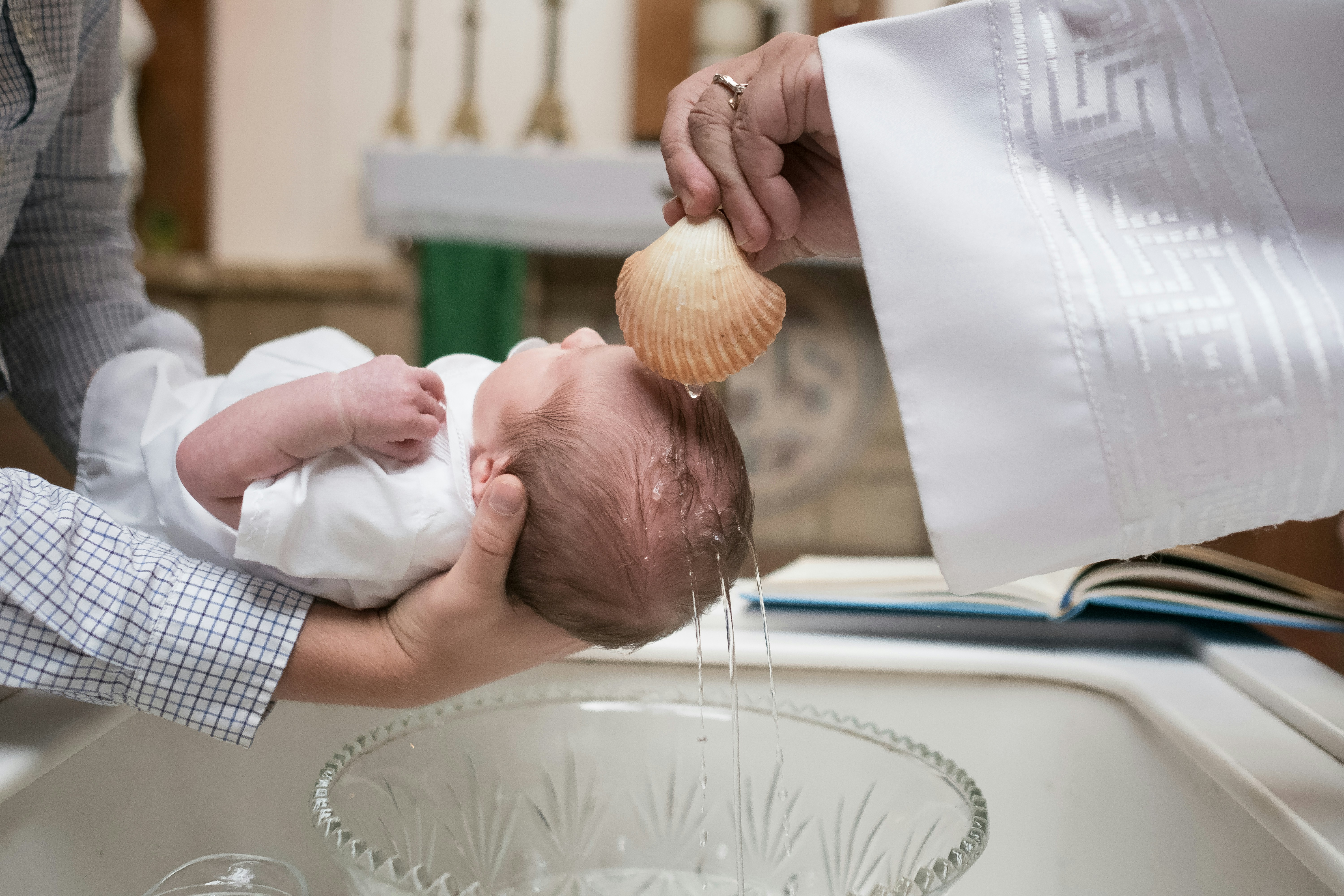 Infant being baptized